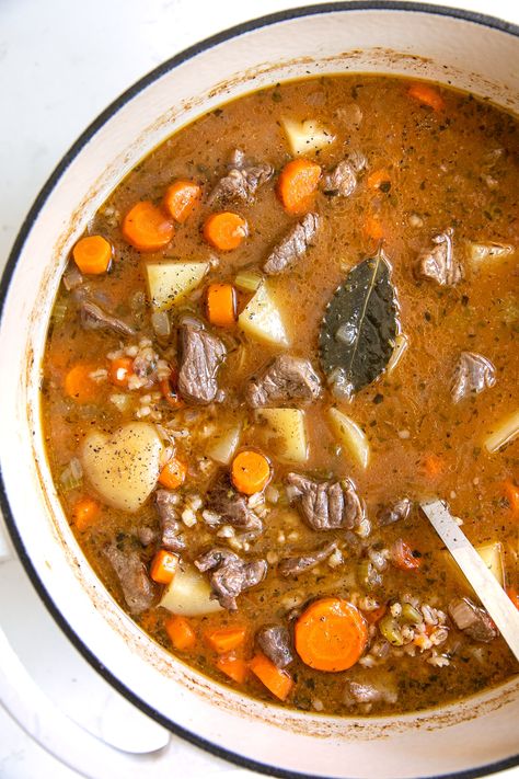 This Beef Barley Soup Recipe is hearty, rich, and deeply satisfying. Made with tender chunks of beef, nutritious vegetables, and chewy barley in a comforting beef and tomato broth. Onion Dishes, Spinach Fritters, Cauliflower Cheddar, Cheddar Cauliflower, Beef And Barley Soup, Nutritious Vegetables, Guinness Stew, Irish Beef Stew, Sandwich Menu