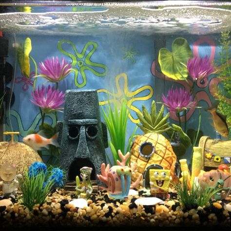 With a Spongebob theme fish tank, you can create a playful and imaginative underwater world that will delight both children and adults alike. It’s the perfect addition to any household that loves the adventures of Spongebob Squarepants and his friends. Aquarium Decorations Ideas, Spongebob Aquarium, Spongebob Fish Tank, Spongebob Theme, Sea Monkeys, Hermit Crab, Aquarium Decorations, Underwater World, Decorations Ideas