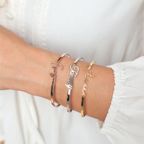 Unwrap happiness with our beautiful Personalized Custom Name Cuff Bracelet. It's the perfect gift for anyone who appreciates the finer things in life. Make someone's day special with this exquisite piece. 🎁 #LulaJewelry #GiftForPartner #GiftForFamily #BirthdayGift #NameNecklace #NameRing #NameBracelet Bracelet Ends, Custom Bangle, Arabic Necklace, English Jewelry, The Bangles, Custom Bracelet, Family Necklace, Bangles For Women, Letter Bracelet