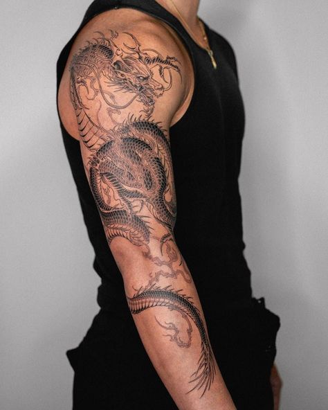 Sleeve Tattoos Men Aesthetic, Men’s Dragon Tattoo Arm, Mens Dragon Sleeve Tattoo, Back Tattoo Tiger For Men, Chinese Dragon Tattoos Shoulder, Dragon Tattoo Wrapped Around Arm Men, Upper Arm Tattoo Men Japanese, Small Body Tattoos Men, Max Holloway Tattoo