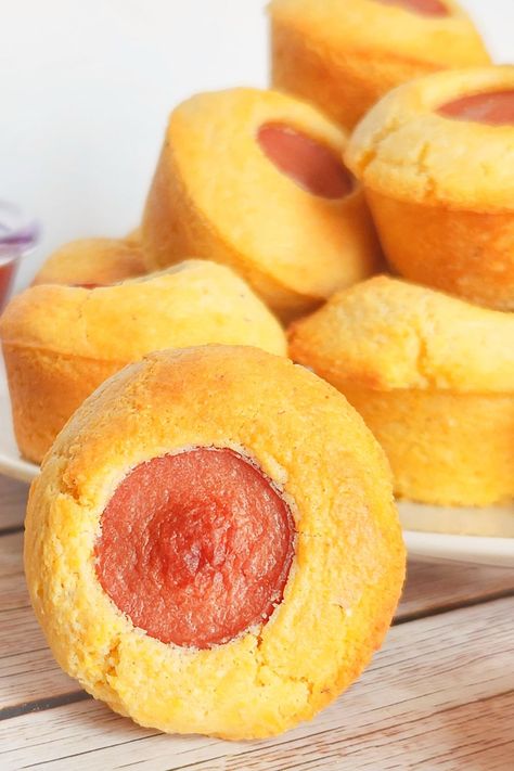 Corn Dog Muffins are a delicious homemade corn dog batter that is then paired with a diced hot dog and baked in a muffin tin. A poppable snack or appetizer to serve up. A kid-friendly hot dog recipe that is perfect for dipping in your favorite sauce. Corndog Muffins Homemade, Corn Dog Bites Recipe, Dog Muffins Recipe, Mini Corn Dog Muffins, Hot Dog Appetizers, Corn Dog Batter, Dog Meals, Dog Muffins, Hot Dog Recipe