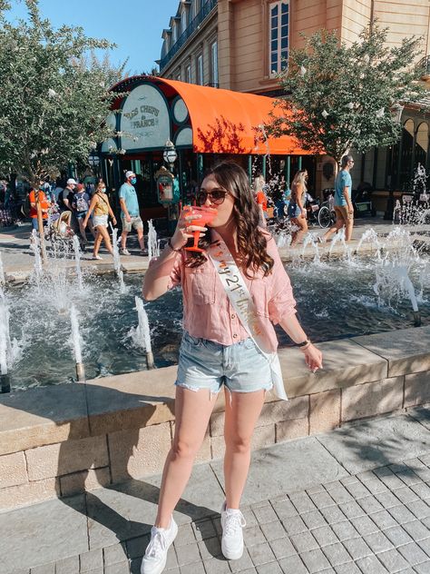 Sipping on rose drink in front of water fountain at Disney Epcot Epcot 21st Birthday Shirts, 21st Birthday At Disney World, 21st Birthday Epcot, Disney 21st Birthday Ideas, Epcot 21st Birthday, Disney 21st Birthday, 21st Birthday Disney, Bestie Birthday Ideas, Drinking Around The World Epcot