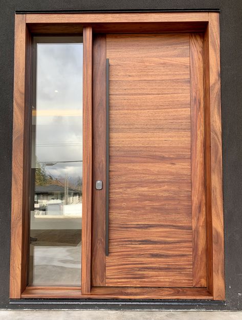 This stunner is perfect for that modern home looking for sleek and simplistic lines with a gorgeous wood flair to it. Solid wood door built from a rich exotic hardwood with a clean push pull handle style. Solid Wood Front Door Modern, Cedar Entry Door, Solid Wood Doors Entrance, Cedar Front Door Entrance, Solid Wood Exterior Door, Mid Century Modern Front Door Entrance, Front Door Handles Modern, Solid Exterior Door, Solid Wood Front Doors