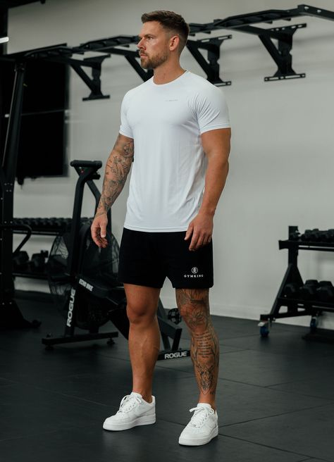 Please note: This product is muscle fit, size up for a relaxed fit. Product Details Men's Training T-Shirt Gym wear Muscle fit Linear Gym King logo to chest Reflective tab to back neck Matte finished textured fabric Performance Properties Breathable Lightweight Sweat wickable Size and Fit Model is wearing: Size Medium Model's height: 5'11" Care and Material Machine wash at 30°C 89% Polyester, 11% Elastane Style Code: SST-BNVRT Gym Looks Outfits Men, Gym Fits For Men, Fit Man Aesthetic, Men Gym Outfits Aesthetic, Man Sport Outfit, Men’s Gym Wear Outfits, Gym Look Men, Men Sport Outfit Gym, Fitness Aesthetic Men