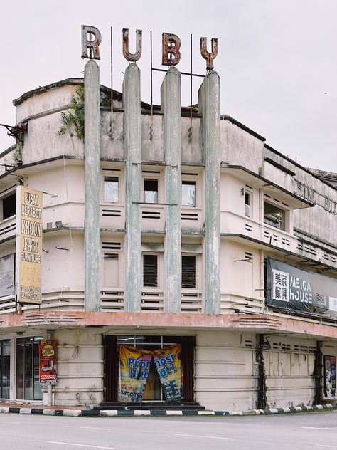 a run down building with a bunch of signs on top of it photo – Free City Image on Unsplash Run Down Buildings, Ipoh Malaysia, Ipoh Perak, Art 2024, Leafy Plants, Free City, Ipoh, City Wallpaper, Urban Spaces