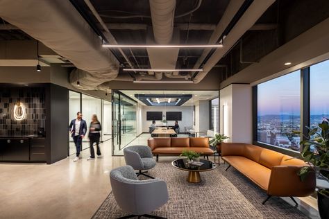 Bernhardt Design's Bombom chair at Orrick LA Offices by Unispace Office Lounge Area Design, Office Lobby Reception, Gender Neutral Bathrooms, Office Waiting Rooms, Executive Room, Office Lobby, Office Lounge, Modular Lounges, Lobby Design