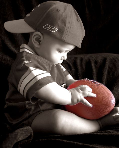 Football Fan - Have to get a picture of Mason like this!! One Year Old Football Photoshoot, Football One Year Old Photos, Baby Football Photoshoot, Football Baby Photoshoot, Baby Football Pictures, Second Birthday Pictures, Meagan Brandy, Sports Poses, Baby Boy Football