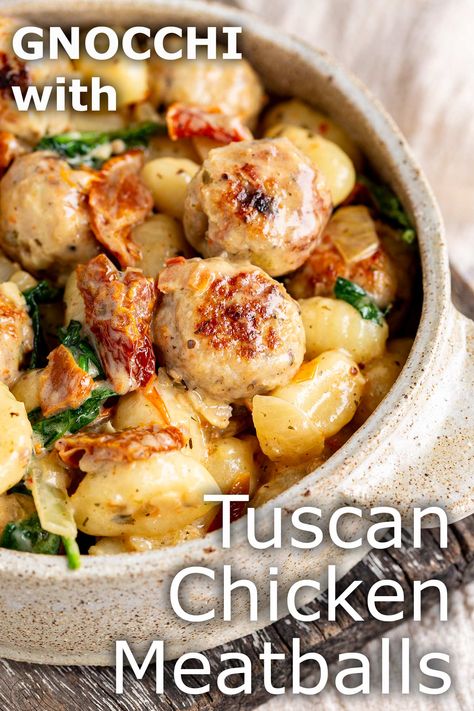 This Tuscan Chicken Meatballs with Gnocchi is a cozy and hearty recipe that can be made in the slow cooker or on the stovetop. Succulent chicken meatballs seasoned with Italian herbs, sun-dried tomatoes, and garlic, bathed in a rich Tuscan-inspired creamy sauce, all mingling with pillowy-soft gnocchi. It's the kind of dish that makes you want to throw on your favorite sweater, grab a bowl, and curl up on the couch. This chicken meatball recipe is easy to make and uses easy-to-find ingredients. Healthy Elizabeth, Chicken Meatball Recipe, Meatball Seasoning, Ground Chicken Meatballs, Slow Cooker Pasta Recipes, Meatball Dinner, Chicken Meatball, Chicken Meatball Recipes, Fancy Dinner Recipes