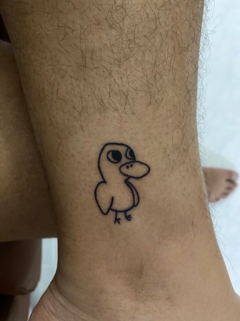 Small Cute Stick And Poke Tattoos, Silly Duck Tattoo, Duck Holding Knife Tattoo, Cute Tattoo Ideas Aesthetic, Small Funny Tattoos Simple, Funny Small Tattoos For Guys, Tattoo Ideas Silly, Funny Duck Tattoo, Small Funny Tattoo Ideas