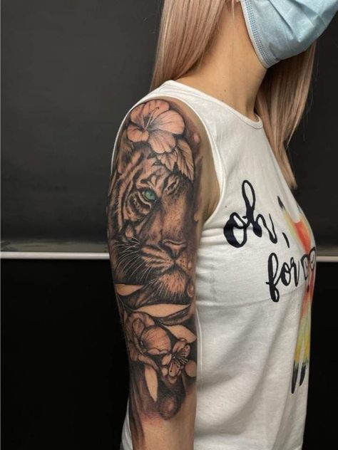 Tiger Flower Sleeve Tattoo, Tiger Sunflower Tattoo, Tiger And Hibiscus Tattoo, Shoulder Tiger Tattoos For Women, Tiger Half Sleeve Tattoo For Women, Women’s Tiger Tattoo, Tiger Shoulder Tattoo Woman, Tiger Arm Tattoo Woman, Half Tiger Half Woman Tattoo