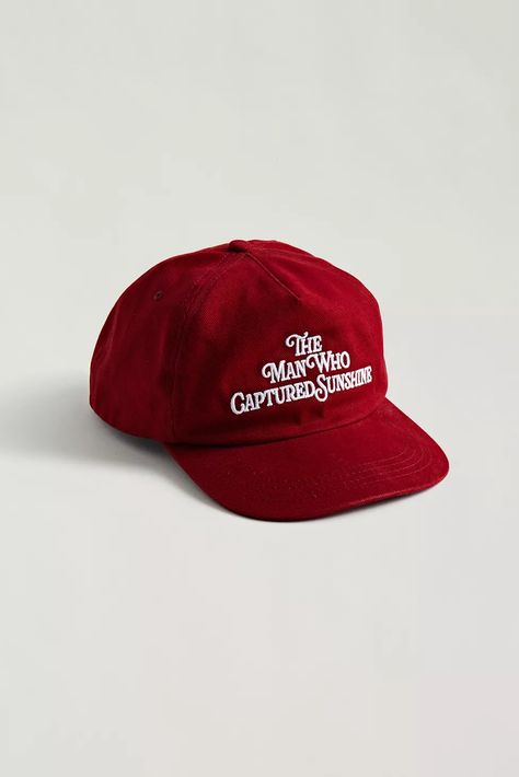 Classic paneled cap by The Man Who Captured Sunshine with embroidered text at the front. Fitted with an adjustable snap closure at the back. Contains affiliate link which may provide a small commission at no additional cost. Mad Cap, Minimal Shirt Design, Street Style Outfits Men, Hat Ideas, Vintage Cap, Street Fashion Photography, Cool Hats, Red Aesthetic, 로고 디자인