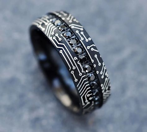 We've crafted the ultimate list of the best wedding bands we can find. From classic yellow gold to wood and tungsten styles, we've covered all the bases. Take a peek at our favorite wedding rings and styles for men! Geek Wedding Rings, Cool Mens Wedding Bands, Mens Wedding Rings Black, Computer Circuit, Mens Wedding Rings Tungsten, Cool Rings For Men, Victorian Pattern, Mens Gold Wedding Band, Mens Wedding Bands Tungsten