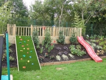 Beautiful Backyards for Families Backyard Landscaping Hillside, Turf Play Area Backyard, Hillside Playground Ideas, Hillside Deck Sloped Backyard, Backyard Slope Ideas, Slope Backyard Landscaping Ideas, Backyard Slope Landscaping, Backyard Landscaping For Kids, Kid Friendly Backyard