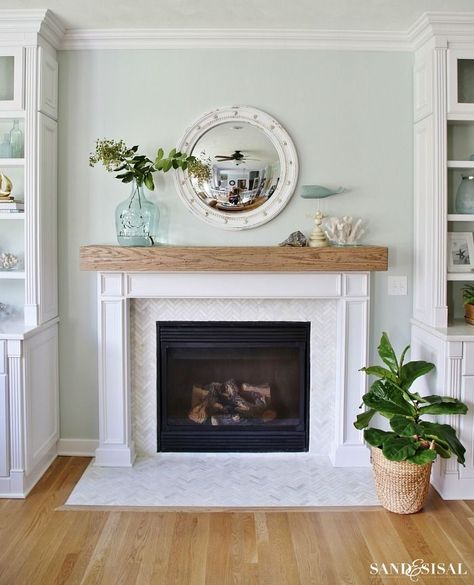 Herringbone tiles are always a good idea! Just look at this stunning fireplace. Coastal Family Rooms, Coastal Fireplace, Beam Mantel, Diy Fireplace Mantel, Fireplace Redo, Wood Fireplace Mantel, Coastal House, Wood Beam, Farmhouse Fireplace