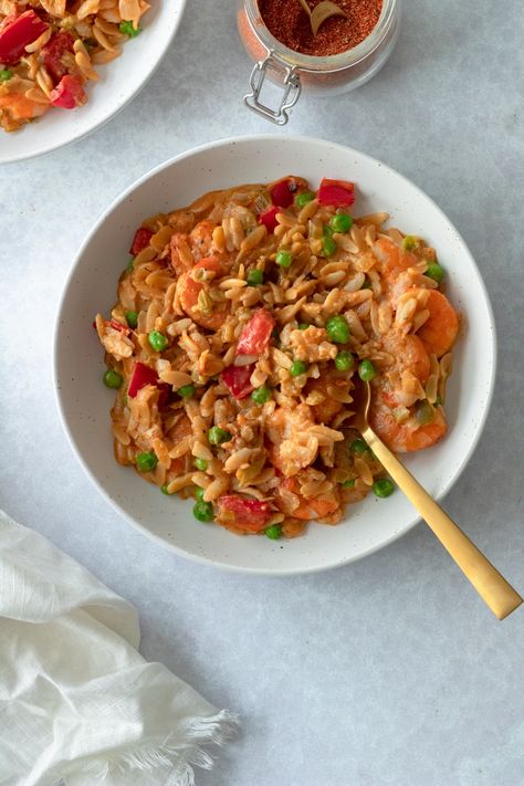 This creamy orzo with shrimp is a flavorful, slightly spicy, one pot wonder. Use your favorite store-bought cajun seasoning or make your own to balance the spice level to your own tastes. With just a few ingredients you'll have a creamy, comforting, easy meal on the table. Cajun Orzo, Orzo With Shrimp, Shrimp Orzo, One Pot Wonder, Creamy Orzo, Cajun Dishes, Orzo Recipes, One Pot Dinner, Spicy Shrimp