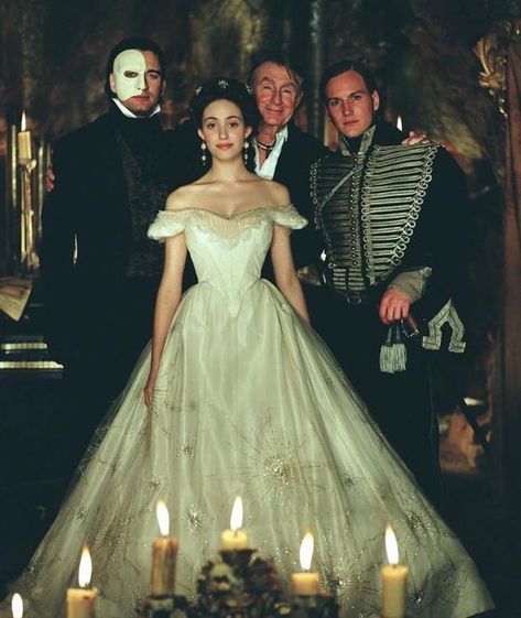 Iconic Beauties🍒 on Instagram: "Emmy Rossum, Gerard Butler, Patrick Wilson and director Joel Schumacher behind the scenes of The Phantom of the Opera, 2004🕯 #phantomoftheopera #thephantomoftheopera #emmyrossum #patrickwilson #gerardbutler #joelschumacher #iconic #beauty #icons #00s #opera #tbt #nostalgia #behindthescenes #behindthescene #onset" Opera Dress, Opera Ghost, Patrick Wilson, Emmy Rossum, Gerard Butler, Movie Costumes, The Opera, Phantom Of The Opera, Costume Design