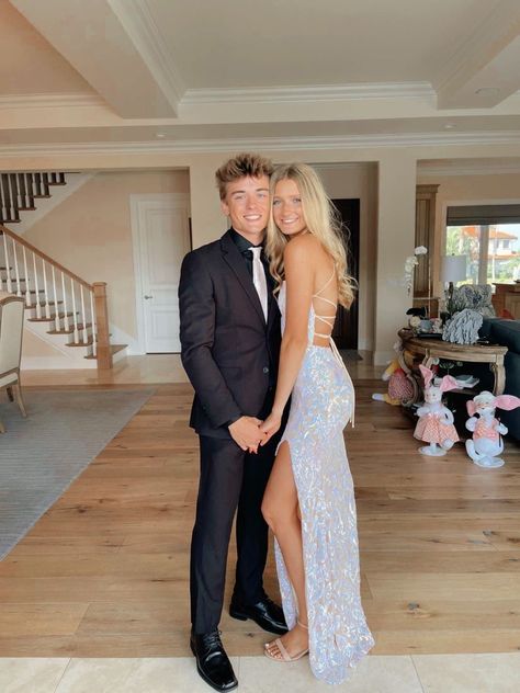 Prom Pic Ideas For Couples Cute Pictures, White Dress And Suit Couple, Prom Duo Outfits, White Iridescent Prom Dress Couple, White Prom Dress Couple Pictures, White Prom Couple Outfit, Bf And Gf Prom Pictures, Periwinkle Prom Dress Couple, Prom Couples White Dress