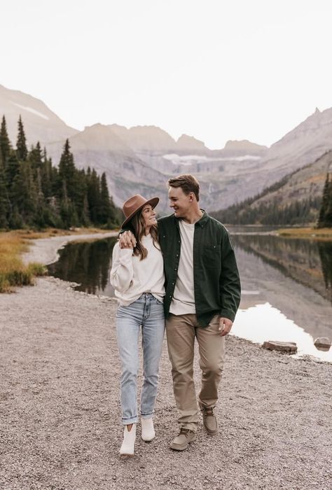 Danielle and Zach's Glacier National Park Fall engagement session was full of sunshine, blue skies, and warm fall colors. A true Montanan DREAM! Casual engagement outfits, mountain engagement, mountain engagement session, Montana engagement session, Montana engagement photos, Montana engagement photographer Fall Engagement Pictures Outfit, Winter Engagement Photos Outfits, Fall Photo Outfits, Fall Engagement Outfits, Mountain Photoshoot, Fall Couple Photos, Engagement Shoot Outfit, Fall Photo Shoot Outfits, Engagement Photo Outfits Fall