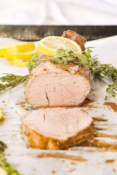 Lemon Pork Tenderloin is full of amazing flavor, marinated in lemon and herbs. It is easy to do on the grill but can also be done in the oven. Lemon Pork Tenderloin, Lemon Pepper Pork Tenderloin, Pork Fillet Recipes, Pork Tenderloin Marinade, Baked Pork Tenderloin, Pork Fillet, Pork Loin Recipes, How To Cook Pork, Baked Pork