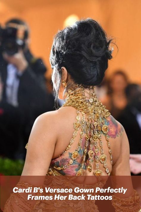 Cardi B, shot from behind, wears chainmail gold gown that reveals her snaking rose back tattoos. Her hair is swept up in a beehive. Gilded Glamour, Dripping In Gold, Versace Gown, Met Gala Dresses, Gala Dress, Versace Dress, Donatella Versace, Back Tattoos, Gala Dresses