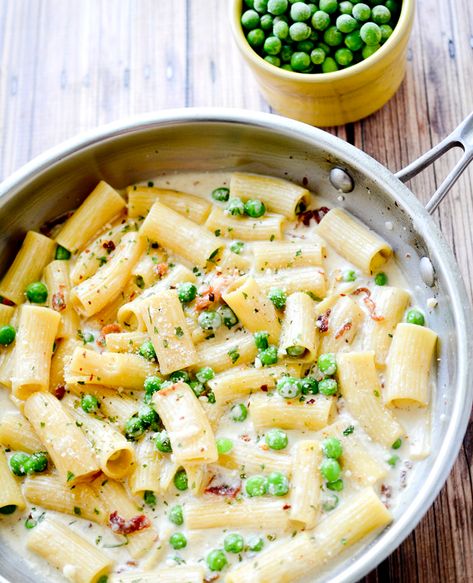 Rigatoni pasta with a creamy Afredo sauce and tossed with bacon and peas makes an easy weeknight dinner for all. Fall Lunches, Pasta With Peas And Bacon, No Bake Pumpkin Cheesecake Bars, Alfredo With Bacon, Pasta And Peas, Peas Bacon, Bacon Peas, Peas Pasta, Bacon Alfredo