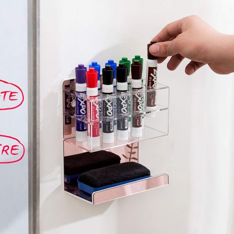 - Acrylic dry-erase marker and an eraser storage rack with sleek rose gold finish. Great for use next to any whiteboard in a home, classroom, or work setting - Features 10 slots specifically designed to hold dry-erase markers. - 1 lower tray allows storage of erasers and rags - Can be mounted to wall surfaces with the proper hardware Whiteboard Marker Holder, Dry Erase Marker Holder, Shadow Box Shelves, Marker Holder, Acrylic Storage, Whiteboard Marker, Wood Shadow Box, Supplies Organization, Dry Erase Markers