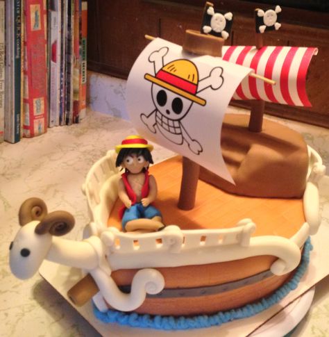 One Piece's "The Going Merry" Pirate Ship Cake featuring Captain Monkey D Luffy! Monkey D Luffy Cake, Luffy Cake, The Going Merry, Pirate Ship Cake, Pirate Ship Cakes, Ship Cake, Boat Cake, Going Merry, Pirates Party