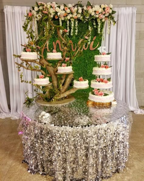 Beautiful cake tree, with backdrop for quinceanera  garden theme Rustic Theme Quinceanera Ideas, Enchanted Forest Quinceanera Cake Ideas, Enchanted Tree Centerpieces, Quinceanera Cakes Enchanted Forest, Neverland Quinceanera Theme, Enchanted Forest Quinceanera Theme Cake, Fairy Garden Quinceanera Theme Cake, Quince Enchanted Forest Theme Cake, Enchanted Forest Themed Cake