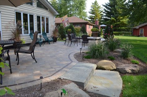 Is your wooden deck splintering, warping or rotting? Instead of spending more cash on deck repairs this spring, read why you should replace your deck with a paver patio! Patio Transition Ideas, Patio With Pavers, Diy Patio Pavers, Pavers Backyard, Paver Designs, Patio Pavers Design, Patio Pavers, Patio Deck Designs, Deck Designs Backyard