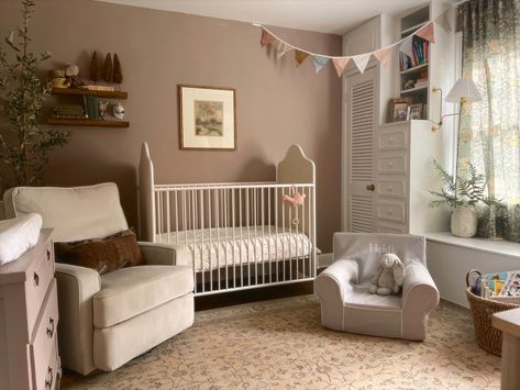 Tan Wall Nursery, Moody Mauve Nursery, Nursery With Window Seat, Dusky Pink Nursery Ideas, Vintage Chic Nursery, Deep Pink Nursery, Beige Nursery Girl, Pink Wall Nursery, Dark Pink Nursery