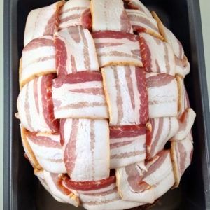 Bacon Wrapped Easter Ham Recipe | DudeFoods.com Bacon Wrapped Ham, Baked Spiral Ham, Recipes With Cooked Ham, Deep Fried Bacon, Bacon Lattice, Precooked Ham, Thanksgiving Ham, Thanksgiving Favorites, Bacon Weave