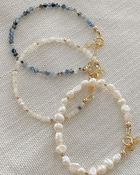 Getting up close and *pearl*sonal with these bracelets – which is your favorite? 🤍  Made with freshwater pearls and real 3mm gemstone beads; the perfect accessory to layer, stack, or wear solo.  The gemstone bracelets come in aquamarine, moonstone, and pink opal for a pop of color; and they pair so well with the pearls and golden paperclip chain bracelet; which you can find in the ‘perfect for stacking’ collection on the site! 💻  . . . .  #pearlbracelet #pearljewelry #handmadejewelryshop #oce... Moonstone Beaded Bracelets, Homemade Pearl Jewelry, Cute Bracelet Stacks, Beaded Bracelets With Words, Pearl Bracelet Ideas, Bracelets Diy Beads, Cute Beaded Bracelets, Bead Bracelet Diy, Pearl Bracelet Stack