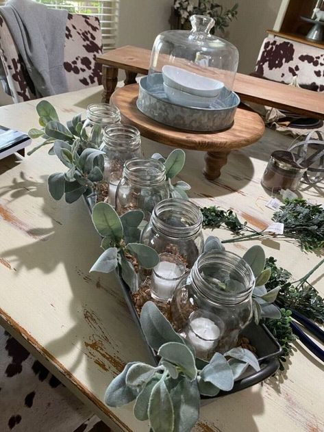 Y’all!! This centerpiece was soo fun and easy and came together in about 15 minutes!! We have previously established that I am a fan of galvanized stuff so I bought this cute trough for no other reason than it was made of galvanized metal!! I have filled it with all the usual decorative items over the years, rope balls, pumpkins, pine cones, all the usual suspects!! I wanted something a little different this time and definitely more height!! Also since we are in the throes of winter, s… Galvanized Trough, Big Jars, Metal Trough, Diy Chalkboard Sign, Modern House Numbers Sign, Drum Shade Chandelier, Mini String Lights, The Usual Suspects, Table Scapes