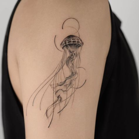 𝑱𝒆𝒍𝒍𝒚𝒇𝒊𝒔𝒉 The fine details and solitary nature of the jellyfish evoke a sense of solitude and elegance. - 𝗩𝗜𝗖𝗘𝗡𝗧𝗘𝗥 𝗧𝗔𝗧𝗧𝗢𝗢 𝗦𝗧𝗨𝗗𝗜𝗢 12C/3 Nguyen Thi Minh Khai, P. Da Kao, Q.1, TP.HCM, Vietnam #banhdonuttattoo #saigonvicenteam #blackworktattoo #jellyfish Two Jellyfish Tattoo, Coelacanth Tattoo, Fine Line Jellyfish Tattoo, Bloom Tattoo, Vietnam Tattoo, Jellyfish Tattoo, Blue Jellyfish, Ink Ideas, March 19