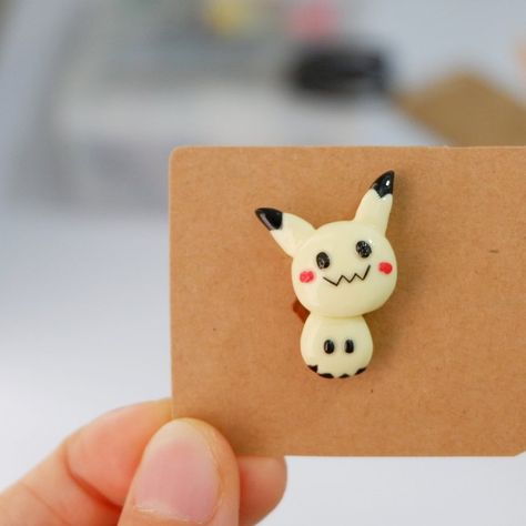 Mimikyu handmade clay pin 💛 DM to preorder or request another character 🔎✨ . . . . . . . . . . . . #handmade #handmadeclay #handmadeclaypin… Clay Crafts Food, Clay Crafts For Kids, Best Picture, Handmade Clay, Clay Charms, Clay Ideas, Christmas 2019, Stamp Crafts, Polymer Clay Crafts