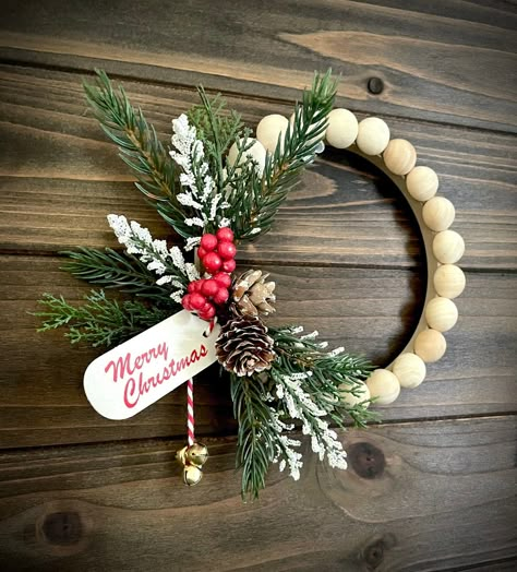 This Wreaths item by BlondeWoodHome has 293 favorites from Etsy shoppers. Ships from Sandwich, MA. Listed on Sep 7, 2024 Space Between Kitchen Cabinets, Bead Wreaths, Mini Wreaths Christmas, Wood Bead Wreath, Frosted Pinecones, Merry Christmas Tag, Senior Crafts, Bead Wreath, Christmas Florals