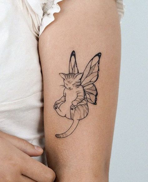 #Welcome to our curated collection of stunning cat tattoo designs that are bound to leave you in awe. In this article, we are excited to unveil the most incredible feline ink art that showcases the beauty and grace of our beloved feline companions. These cat tattoos not only capture the essence of these enigmatic creatures but also serve as a testament to the artistic prowess of the tattooists behind them. Whether you're a cat lover or simply appreciate exquisite body art, prepare to be amazed b 2 Cats And A Dog Tattoo, Cute Matching Tattoo Ideas, Cat Design Tattoo, Tattoo Ideas On Arm, Tattoo Gato, Tatuaje Studio Ghibli, A Small Tattoo, Kitten Tattoo, Couple Tattoo