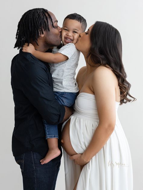 Mom and Dad kiss their happy young son's cheeks during a Family Maternity Session in our natural light studio near the Grant Park area of Atlanta, Georgia by Lily Sophia Photography. Pregnant Mom And Daughter Photos, Maternity Photography With Son, Family Maternity Pictures With Siblings, Maternity Photography Family Of 3, Maternity Session With Toddler, Couple Pregnancy Pictures, Bump Photoshoot, Mom Dad And Baby, Family Maternity Session