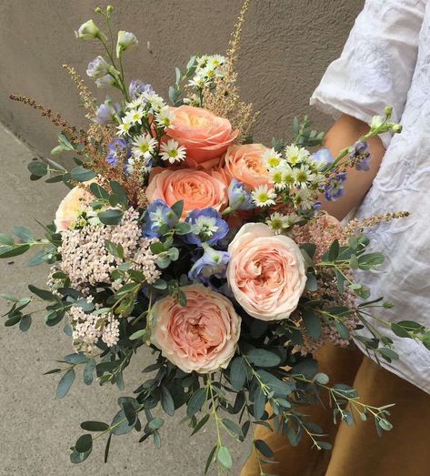 Peach And Navy Wedding Flowers, Coral And Blue Flower Arrangements, Blue And Peach Floral Arrangements, Blue Peach Bouquet, Coral Blue Purple Wedding, Blue Peach Flowers, Peach Pink Blue Wedding, Purple Blue And Peach Wedding, Blue And Coral Bouquet