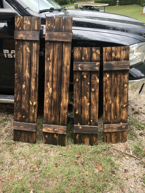 Burned pine shutters Barnwood Shutters Exterior, Pine Shutters Exterior, Pallet Shutters Diy, Pallet Shutters Exterior, Diy Wooden Shutters Exterior, Rustic Shutters Exterior, Dark Wood Shutters, Pallet Wood Shutters, Diy Shutters Exterior