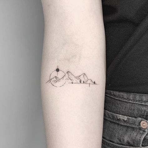 Elevate your style with mountain tattoos. In this article, we will share the best designs from geometric lines to realistic depictions. Jt Tattoo, Moutain Tattoos, Small Mountain Tattoo, Geometric Mountain Tattoo, Bachelorette Tattoos, Mountain Tattoos, Mountain Tattoo Simple, Lord Of The Rings Tattoo, Mountain Tattoo Design