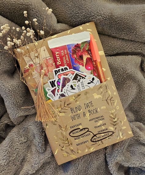 SURPRISE BOOK! blind date with a book will be a popular booktok book! Choose genre and either hardback or paperback each book comes with a bookmark, pen and post it's for annotations and stickers!💟#LoveStory #RomanticEncounters #HeartfeltConnections #DateNightIdeas #SoulmateSearch #FlirtyFridays #CandlelitDinners #StarryEyedMoments #LoveQuotes #DreamyDates #WhisperedPromises #AmourAdventures Bookmark Pen, Blind Date With A Book, Date With A Book, Book Wrap, Haunted Dolls, Blind Date, Blind Dates, Encouragement Gifts, Diy Creative Crafts