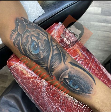 Tiger Eye Tattoo For Women, Eye Tattoo Ideas Black Women, Eye Tattoo Black Women, Lion Eyes Tattoo Forearm Women, Tiger Eyes Tattoo For Women, Blue Tattoo On Brown Skin, Shoulder Name Tattoo, Tiger And Human Eye Tattoo, Tiger Eyes Tattoo For Women Sleeve