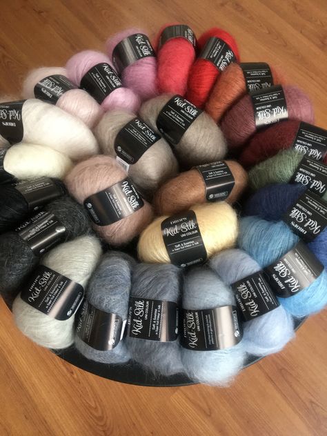 A luxurious, light brushed yarn in an exclusive mix of 75% mohair super kid and 25% mulberry silk Content: 75% Mohair, 25% Silk Yarn Group: A (23 - 26 stitches) Weight/length per ball: 25 g = approx 210 meter Recommended needle size: 3,5 mm Knitting tension: 10 x 10 cm = 23 sts x 30 rows Made in EU *Colours can vary due to monitors settings  A luxurious, light brushed yarn in an exclusive mix of 75% mohair super kid and 25% mulberry silk, DROPS Kid-Silk is feather light, and will give garments a Drops Kid Silk Mohair, Silk Yarn Projects, Mohair Sweater Pattern, Mohair Knitting, Hair Yarn, Yarn Gifts, Mohair Knit, Mohair Yarn, Metallic Yarn