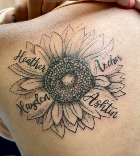 Sunflower Name Tattoos For Women, Sunflower With Names Tattoo, Sunflower And Heart Tattoo, Sunflower Tattoo With Kids Names, Sunflower With Name Tattoo, Sunflower Tattoo With Name, Grandchildren Tattoo Ideas, Grandkids Tattoo Ideas, Thigh Tattoo Quotes