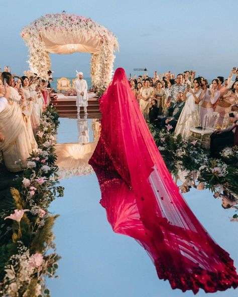 From bride's beautiful self-design red lehenga to exquisite baby breaths phoolon ki chaddar, from her dupatta trail to bridesmaids' twinning outfits, from her dream bridal entry to breathtaking varmala photos, there's nothing not to love about this gorgeous bride Thailand wedding 😍 Taf a friend who is getting married soon and share this dreamy wedding inspiration with them. Couple: @kashtag90 @jhalakshah_ Planner: @krish_events Venue: @avanihuahin Decor: @dp_designbypeerapach Light and So... Bridal Entry Songs, Indian Bridal Entry, Songs Trending, Twinning Outfits, Indian Wedding Venue, Indian Wedding Pictures, Bridal Entry, Bride Entry, Reception Bride