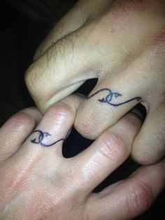 25 Finger Tattoo for Couples That Are An Emblem of True Love & Romance - Hike n Dip Land Tattoos, Fishing Hook Tattoo, Hook Tattoos, Finger Tattoos For Couples, Ring Tattoo Designs, Wedding Band Tattoo, Tattoo Band, Country Tattoos, Wedding Ring Tattoo