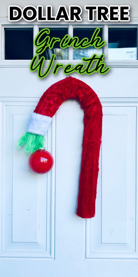 DIY Dollar Tree Grinch Wreath hanging on a white door Dollar Tree Grinch Wreath, Dollar Tree Grinch, Make A Grinch, Grinch Wreath, Grinch Party, Holiday Wreath, Holiday Wreaths, How To Make Wreaths, Festival Decorations