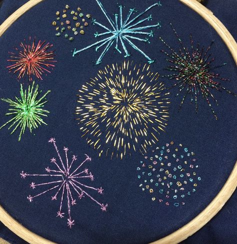 An image of a firework embroidery on navy blue fabric stitched with metallic threads Diy Embroidery Letters, Stitch Portrait, Printable Cross, Stitch Crafts, Eight Pointed Star, Stitch Diy, Ideas Embroidery, Stitch Tutorial, Beautiful Cross Stitch