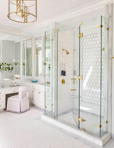 A frameless glass walk-in shower boasts a glass door with a lucite and brass handle and is accented with white and gray mosaic marble wall tiles. Shower Wall Tile, Bathroom Modern, Master Bath Remodel, Shower Niche, Bathroom Renos, Traditional Bathroom, Bathroom Remodel Master, Bath Remodel, Glass Shower